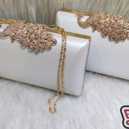 کیف زنانه دهانه فلزی پاسپورتی مجلسی طاووسی متالیک کد 1284