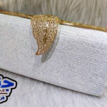 کیف دهانه فلزی زنانه مجلسی pasporti لمه خطی سفید کد 1193